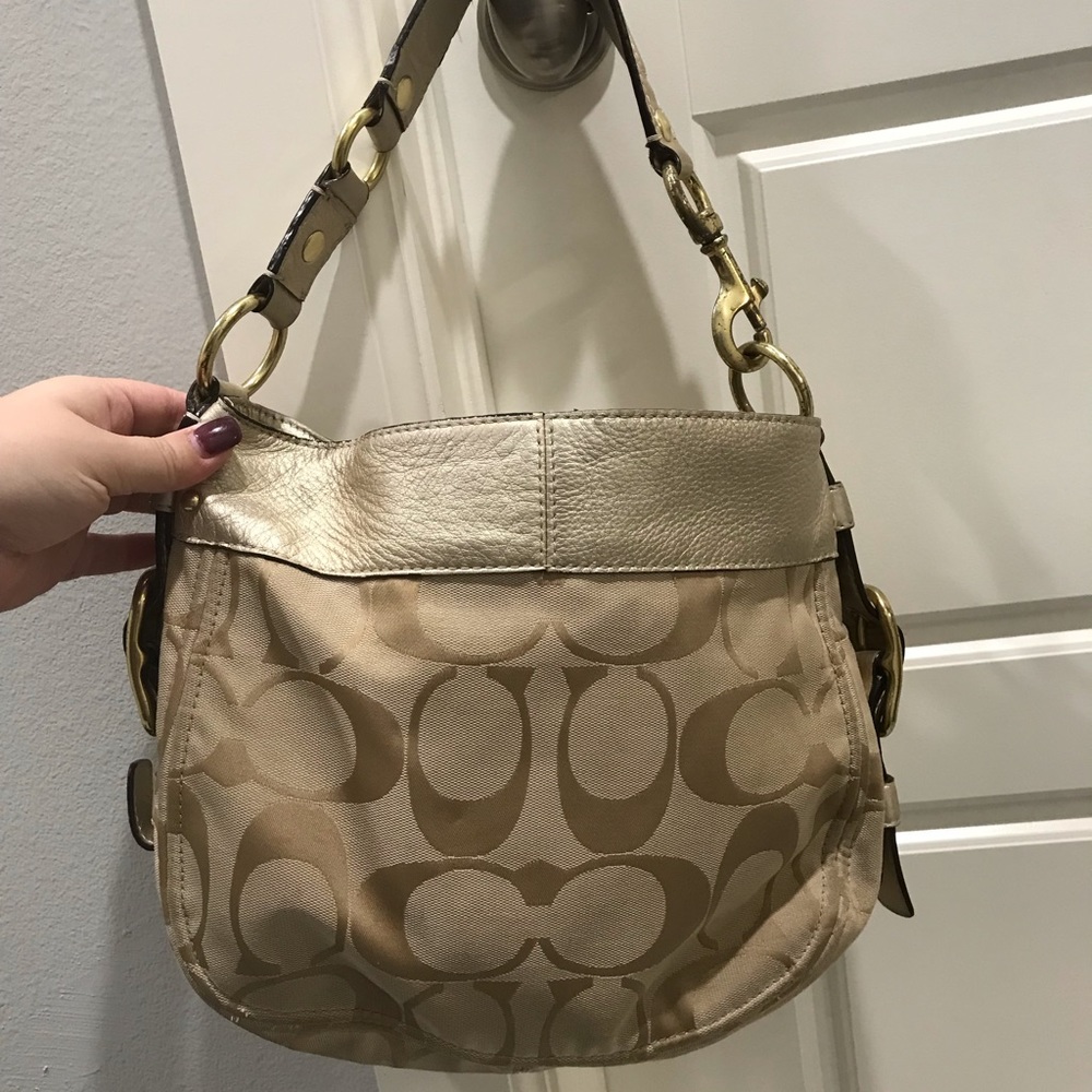 Gold Coach purse w/ coral interior